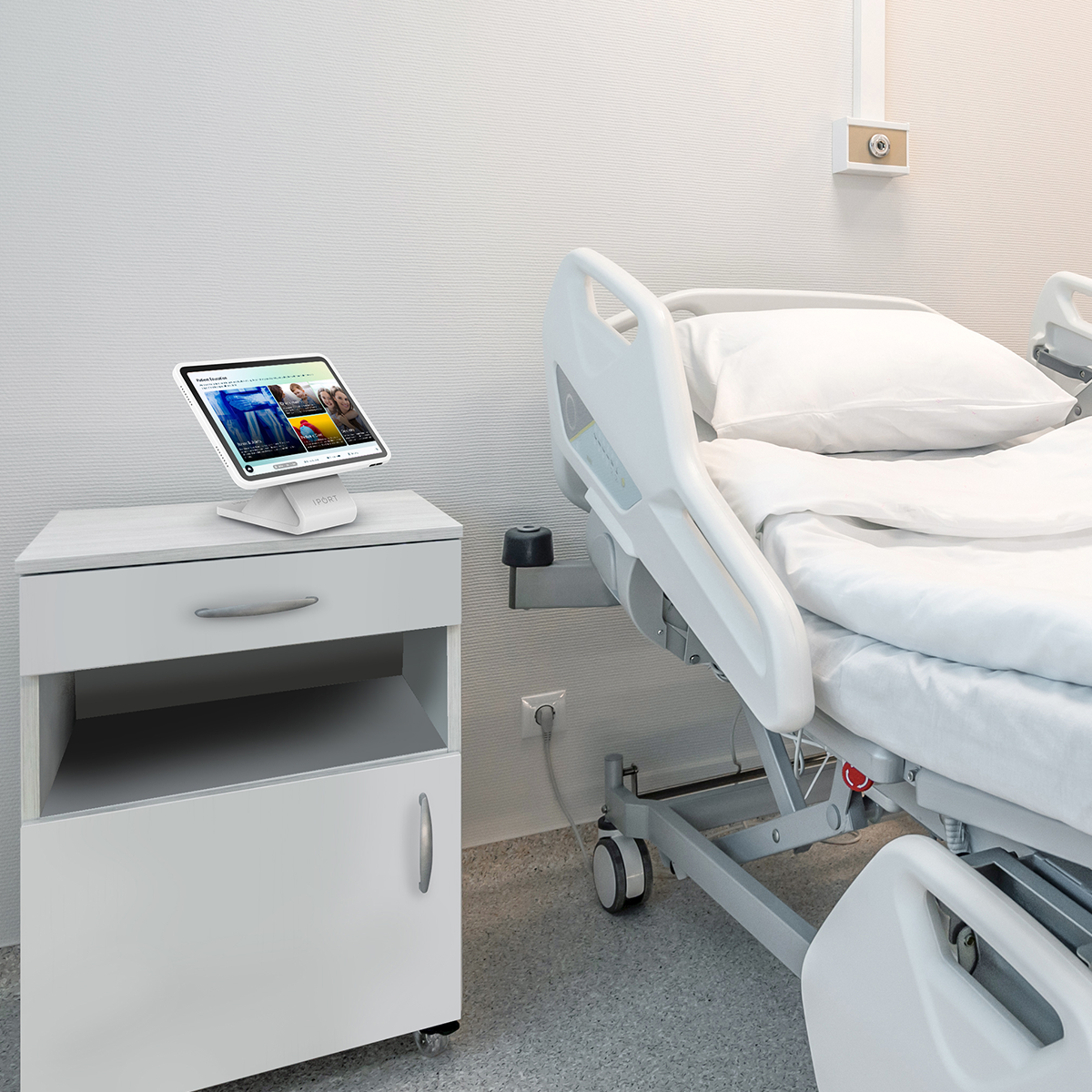 iPad mounted at hospital bedside for patient engagement using IPORT